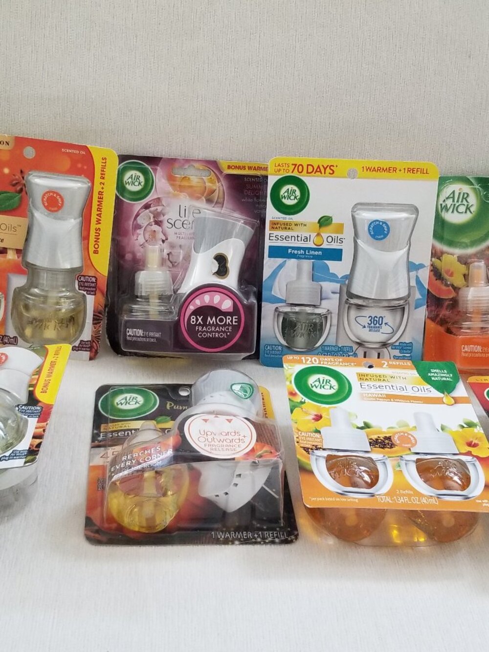 9 Air wick  packages Warmer and refills Brand New mix lot